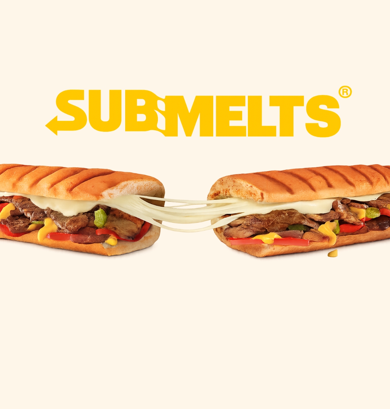 Two toasted SubMelts pulled apart with melted cheese stretching between them